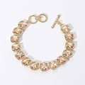 7″ Gold Bracelet with Champagne Emerald Cut Crystals + Toggle Closure