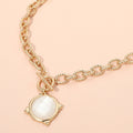 16″ Gold Compass Pendant Choker with Front Toggle & Faceted Stone